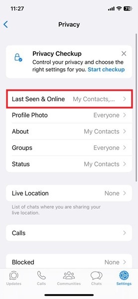 Tapping on "Last Seen & Online" option in Privacy menu in WhatsApp for iOS.