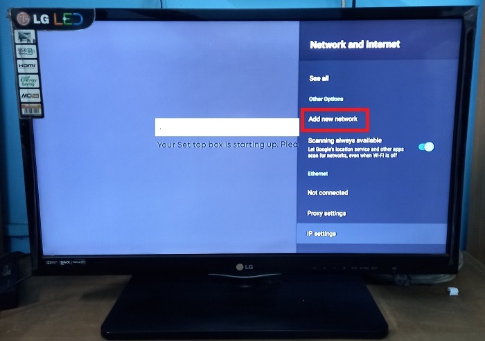 Click "Add new network" under a smart TV's "Network and Internet" options. 