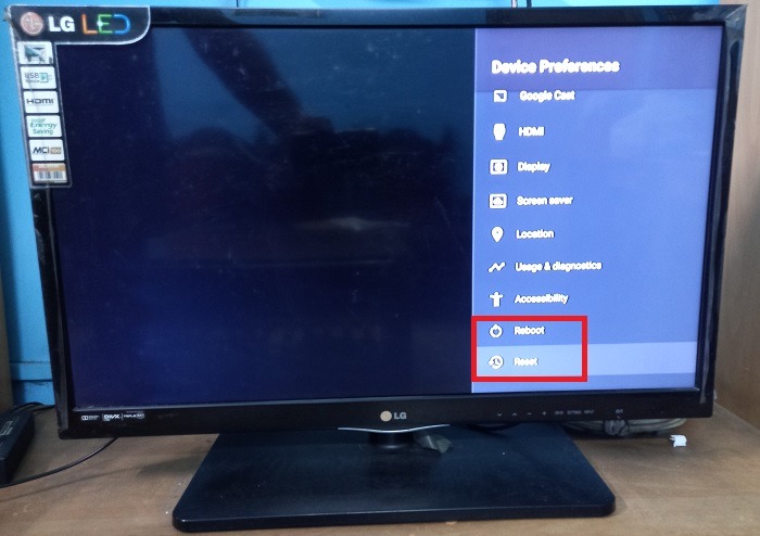 Selecting a TV's Reboot and Reset options from "Device Preferences." 