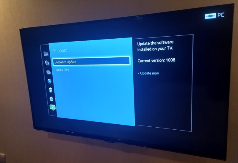 Update the software version on your television using the menu options.