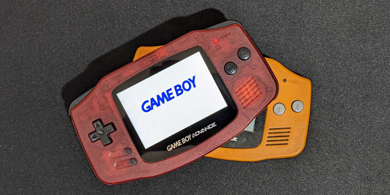 A photograph of two Game Boy Advance units stacked on top of each other.