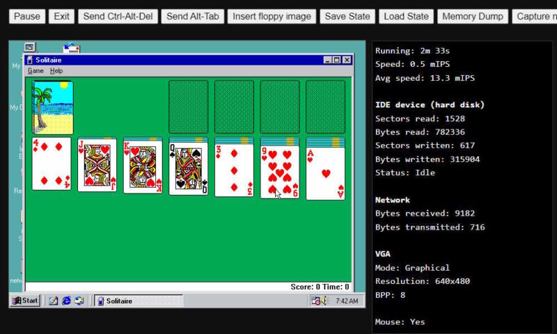 Windows 98 desktop opened in a  browser emulator showing a game of Solitaire.